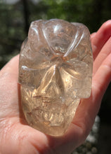 Load image into Gallery viewer, “Prismatic Traveller” Star Being carved skull in mystical Smoky Quartz