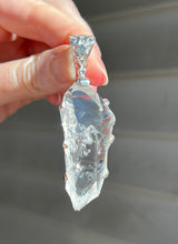 Load image into Gallery viewer, Luminous Arkansas Quartz with bridge formation and Blue Topaz pendant