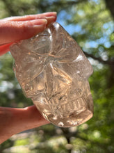 Load image into Gallery viewer, “Prismatic Traveller” Star Being carved skull in mystical Smoky Quartz