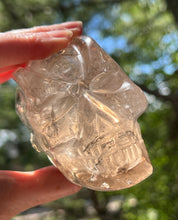 Load image into Gallery viewer, “Prismatic Traveller” Star Being carved skull in mystical Smoky Quartz