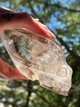 Load image into Gallery viewer, “Prismatic Traveller” Star Being carved skull in mystical Smoky Quartz