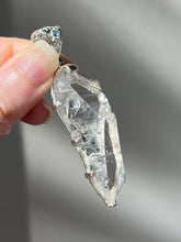 Load image into Gallery viewer, Luminous Arkansas Quartz with bridge formation and Blue Topaz pendant