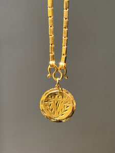 23k solid yellow gold 22 inch Thai baht chain necklace with pretzel clasp - stamped “965%”