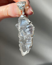 Load image into Gallery viewer, Luminous Arkansas Quartz with bridge formation and Blue Topaz pendant