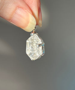 Luminous 11.8 carat Herkimer Diamond pendant with penetrating side car crystal