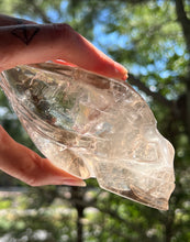 Load image into Gallery viewer, “Prismatic Traveller” Star Being carved skull in mystical Smoky Quartz