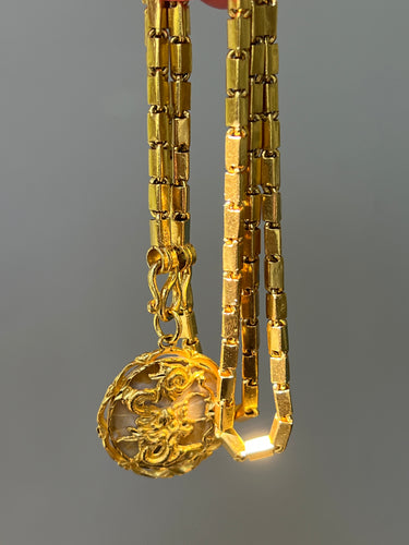 23k solid yellow gold 22 inch Thai baht chain necklace with pretzel clasp - stamped “965%”