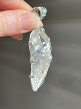 Load image into Gallery viewer, Luminous Arkansas Quartz with bridge formation and Blue Topaz pendant