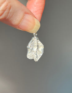 Luminous 11.8 carat Herkimer Diamond pendant with penetrating side car crystal