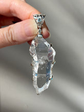 Load image into Gallery viewer, Luminous Arkansas Quartz with bridge formation and Blue Topaz pendant