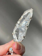 Load image into Gallery viewer, Luminous Arkansas Quartz with bridge formation and Blue Topaz pendant