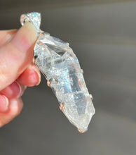 Load image into Gallery viewer, Luminous Arkansas Quartz with bridge formation and Blue Topaz pendant