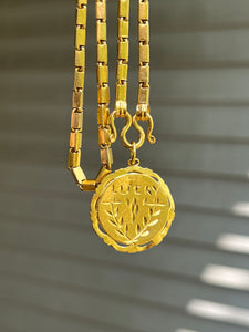23k solid yellow gold 22 inch Thai baht chain necklace with pretzel clasp - stamped “965%”