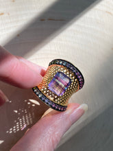 Load image into Gallery viewer, Blue and Purple Fluorite cage ring with Diopside, Iolite, Amethyst, Topaz and Garnet