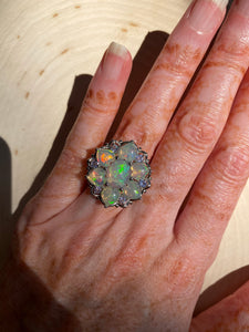 Magical XL Ethiopian Opal Hearts and Tanzanite rounds ring