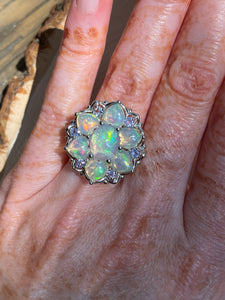 Magical XL Ethiopian Opal Hearts and Tanzanite rounds ring