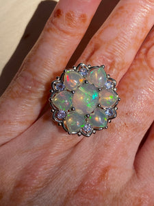 Magical XL Ethiopian Opal Hearts and Tanzanite rounds ring