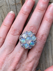 Magical XL Ethiopian Opal Hearts and Tanzanite rounds ring