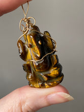 Load image into Gallery viewer, Tiger Eye carved Ganesha wire wrapped pendant