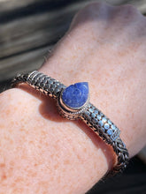 Load image into Gallery viewer, Carved Tanzanite braided sterling silver collectors bracelet