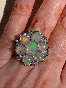 Magical XL Ethiopian Opal Hearts and Tanzanite rounds ring