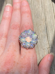 Magical XL Ethiopian Opal Hearts and Tanzanite rounds ring