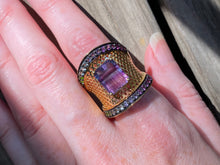 Load image into Gallery viewer, Blue and Purple Fluorite cage ring with Diopside, Iolite, Amethyst, Topaz and Garnet