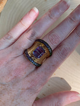 Load image into Gallery viewer, Blue and Purple Fluorite cage ring with Diopside, Iolite, Amethyst, Topaz and Garnet