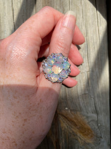 Magical XL Ethiopian Opal Hearts and Tanzanite rounds ring